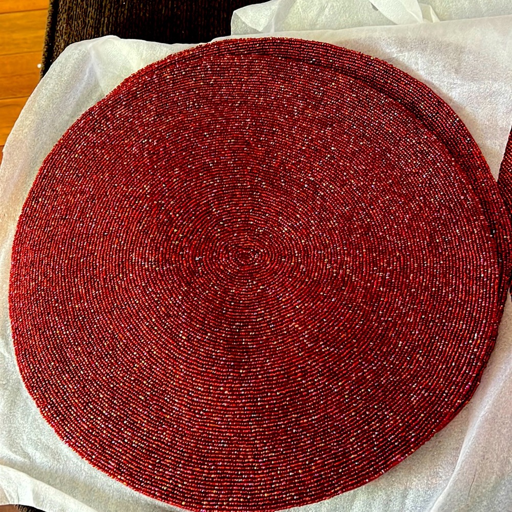 Pottery Barn beaded placemats. Round. Deep ruby red color.